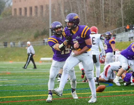 Two football players at a game